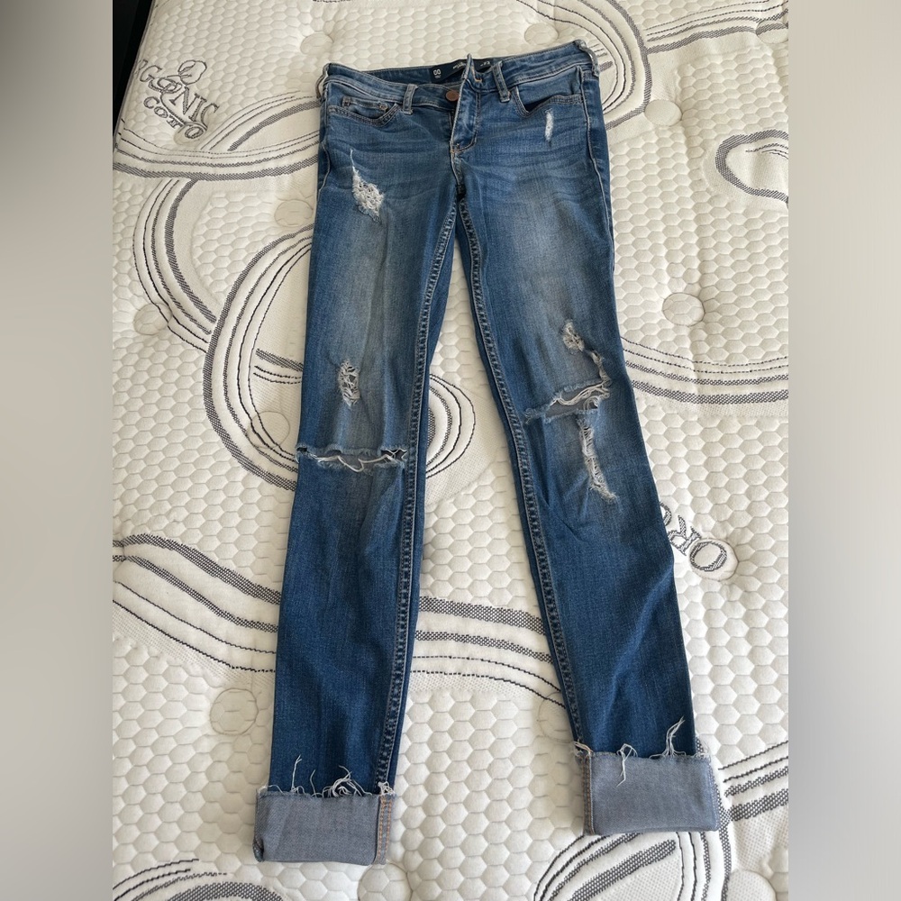 Women's Distressed Blue Jeans